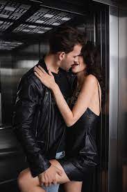 Man Kissing Neck and Holding Leg Stock Image - Image of embrace, elevator:  202330127