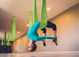 Aerial yoga is a hybrid yoga practice which combines traditional hatha yoga poses, aerial acrobatic arts and body conditioning exercises performed with the aid of an aerial hammock. Antigravity Yoga Asana Or Acrobatics The Yogalondon Blog