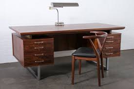 This Vintage Mid Century Rosewood Executive Desk Features A Floating Top Six Drawers Two Pull Out Trays And Steel Legs An Rose Wood Desk Executive Desk Desk