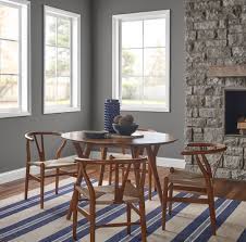 Using a color wheel from the paint manufacturer of your choice, create a color scheme of three different colors for your two rooms. Relaxed Calming Dining Room Ideas And Inspirational Paint Colors Behr