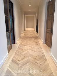 Herringbone Floor Details Tale Of Four Projects Segreto Floors By Custom Floors Unlimited House Flooring Flooring Floor Design