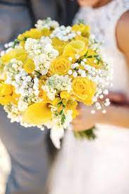 Yellow roses are most rose colors that have meaning, and yellow roses generally symbolize friendship. Kristin And Eric S Wedding In Brewster Massachusetts Yellow Wedding Flowers Yellow Wedding Bouquet Spring Wedding Flowers