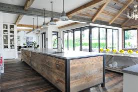 Long Reclaimed Wood Plank Kitchen Island Boasts An Industrial Farm Style Mix Under Me Reclaimed Wood Kitchen Reclaimed Wood Kitchen Island Metal Kitchen Island