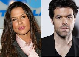 Why Run to the TARDIS: Rhona Mitra & Robert Baker Cast in Supergirl