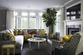 Updating A 1930s Colonial House To A Unique Family Home Freshome Com Yellow Living Room Living Room Grey Living Room Design Modern