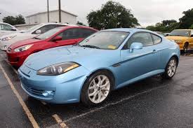 Inside, the seats are comfortable and well bolstered, and the instruments are backlit in a cool blue. Blue Hyundai Tiburon For Sale Used Cars On Buysellsearch