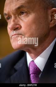 New York Police Department Commissioner James O'Neill embraces Leanne  Simonsen, wife of NYPD Detective Brian Simonsen's during during her  husband's funeral at Saint Rosalie Roman Catholic Church in Hampton Bays,  N,Y., Wednesday,