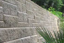 These walls consist of an engineer designed reinforced concrete footing to anchor the wall against overturning and a wall of concrete blocks filled with a concrete grout mix. Replace A Failing Concrete Block Wall