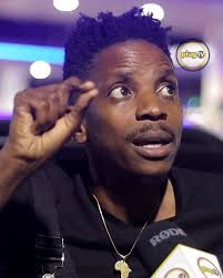 Eric Omondi Chasing Sgr by Bike