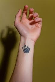While this may be a little joke piece, it could also stand for something bigger. Wrist Small Paw Tattoo Novocom Top