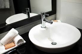 faucet extend into the bathroom sink