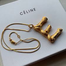Get the lowest price on your. Celine Alphabet Necklace Only Worn Briefly Very Depop