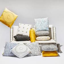 One of the most classic color choices for throw pillows for brown couches is a rich cream. Pairing Outdoor Pillows With Your Patio Furniture Stori Modern