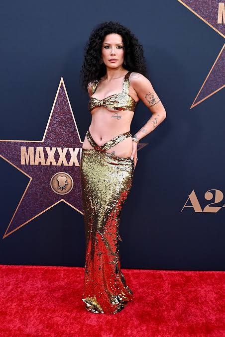 MaXXXine' Red Carpet Premiere: Halsey Shines in Gold & More [PHOTOS]