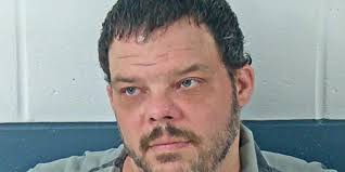 Domestic dispute in parking lot lands man behind bars