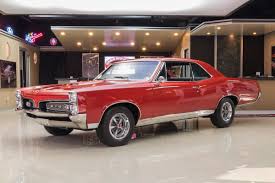 Image result for Ruby Red 1967 AC Cars