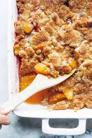 Begin peeling, pitting and slicing the peaches. Best Peach Cobbler Recipe Pinch Of Yum