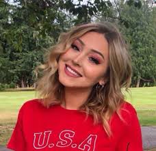 Where is Liz's kid during dog walking?