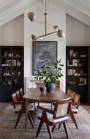 It is most pleasing to the eye for the rug to reflect the shape of the table. Oak Oval Dining Table With Rope And Wood Chairs Cottage Dining Room