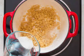 Couscous is a berber dish of small (about 3 millimetres (0.12 in) in diameter) steamed balls of crushed durum wheat semolina that is traditionally served with a stew spooned on top. Israeli Couscous Salad Recipe With Simple Lemon Dressing Currytrail