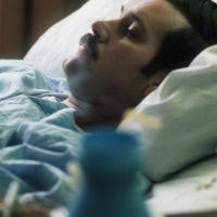 Former POW and U.S. Air Force SSGT Roy Madden Jr. in his hospital bed at  the Grant Medical Center. SSGT Madden was captured