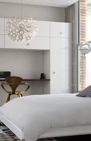 White Bedroom With Mid Century Modern Twist Modern Bedroom Design With White Gloss W White Gloss Bedroom Furniture White Gloss Bedroom White Bedroom Furniture
