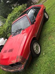 Image result for Bright Red 1980 Capri