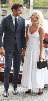 Fans are convinced bradley cooper and lady gaga are secretly in love—here's what you need to know about the wild theory. Lady Gaga Holds Hands With Bradley Cooper At A Photocall In Venice Daily Mail Online