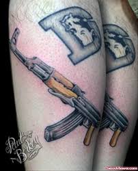 Tour a blue and white house designed by mark d. Alphabet D And Gun Tattoo