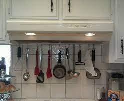 Then place hooks, insert anchors and drill in screws. Tension Rod And Ikea S Hooks Tension Rod Kitchen Hacks Kitchen