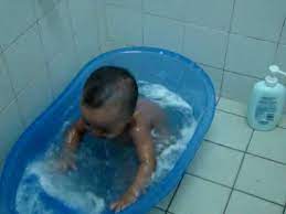 Remember these bathing tips to keep your child safe while getting squeaky clean: 10 Month Old Baby Happily Splashing In Bath Tub Youtube