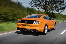More specifically, the random house unabridged dictionary defines gt as an automobile in the style of a coupe, usually seating two but occasionally four, and designed for comfort and high speed. Ford Mustang Gt 5 0 V8 2018 Uk Review Autocar