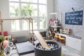 Today's generation of interior designers and homeowners have both ditched the idea of loud mismatched colours, solid wood furniture and the infestation of stuffed animals. Our Modern Playroom Design Reveal Oh Happy Play