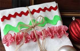 Paint your child's hand with green paint. 9 Holiday Dish Towels You Can Sew For Christmas