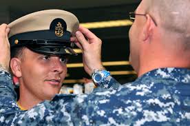 File:US Navy 110811-N-ER662-039 Chief Machinist Mate (Select) Robert F.  McKinney gets fitted for his new combination cover during the NEX Uniform  Night.jpg