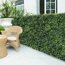 I suggest starting in an upper corner with a full piece and working your way horizontally and then adding rows one by one beneath them. Costway 12 Pcs 20 X20 Artificial Boxwood Plant Wall Panel Hedge On Sale Overstock 30618895