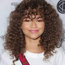 With the beauty of curly hair can sometimes come a struggle to style it. How To Style Naturally Curly Hair