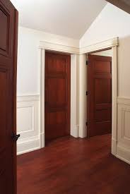Custom 3 Panel Mahogany Interior Door With Craftsman Style Painted Door Casing And Cherry Hardwood Floor Drzwi Custom Interior Doors Cherry Hardwood Floo
