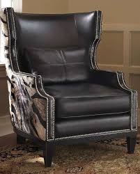 Tastefully Modernize Your Living Space With A Comforting Balance Of Form Function And Flair Cowhide Chair Wingback Chair Big Comfy Chair