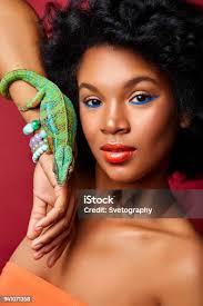 Beautiful Woman With Chameleon Stock Photo