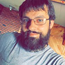 Where to stay in Maine for good snowmobiling and bar access?