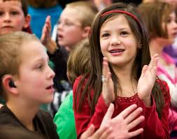 Teachers, parents surprise students with flash mob