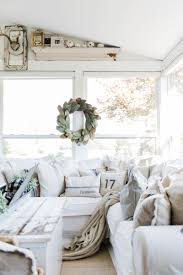 Modern farmhouse style combines clean sleek lines of the contemporary style with a cozy farmhouse aesthetic. Cozy Farmhouse Fall Sunroom Liz Marie Blog