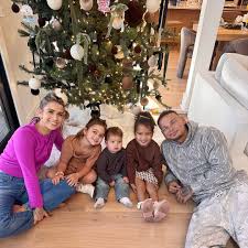 Kane and Katelyn Brown with their kids Kingsley, Kodi and Krewe in their  Thanksgiving day family photo! ❤