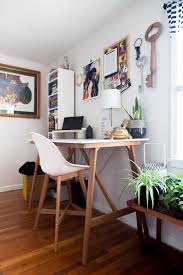 The Afro Minimalist S Small Apartment Is A Peaceful Practical Oasis Home Bar Furniture Bar Furniture Standing Desk Design