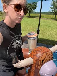 Poured me a Vacation” ✓ JJ T-shirt with custom sleeve tailoring ✓ Stock  tank pool ✓ Longhorn floatie ✓ Ready for summer! ☀️