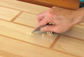 Burnish the edge with the burnisher parallel to the floor and edge of the tool. Using And Burnishing A Cabinet Scraper
