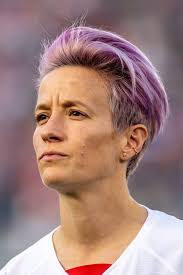 Megan Rapinoe S Hair Just Got Even Brighter With Her New Magenta Color Megan Rapinoe Magenta Hair Colors Magenta Hair
