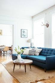 Coffee tables have actually just recently become one of the elements that are often present in the living room as way of life patterns drink on growing coffee. Sofa Blue Sisal Carpet White Round Coffee Table Walls Dekoideen Flowers Teal Couch Living Room Living Room Turquoise White Sofa Living Room Decor