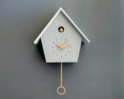 cuckoo clock gsc02bac concrete coated with yellow etsy in 2021 cuckoo clock modern cuckoo clocks cuckoo clock decor